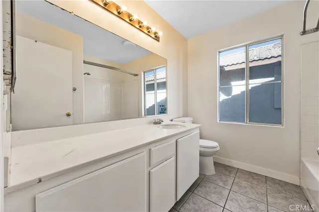 a view of bathroom with a sink and a toilet