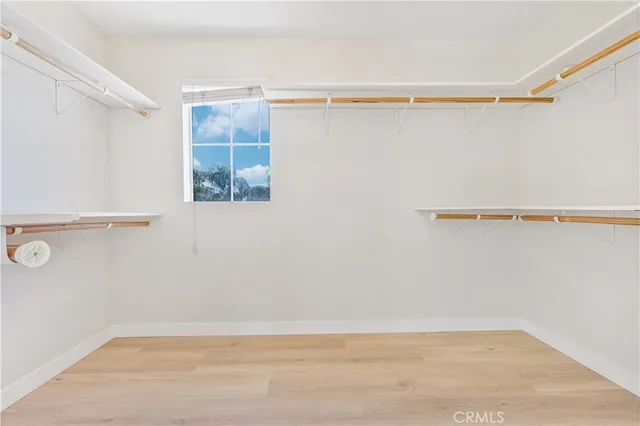 a view of a room with shelf on the wall
