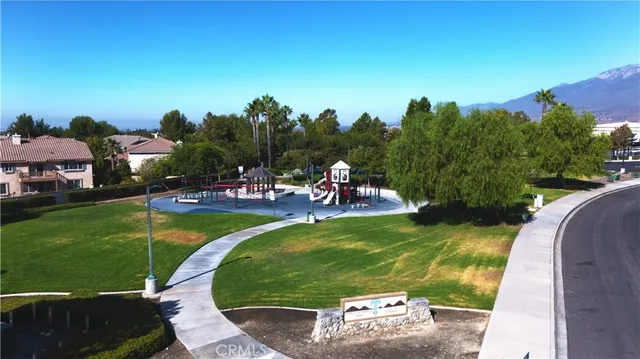 an aerial view of residential house with outdoor space and swimming pool