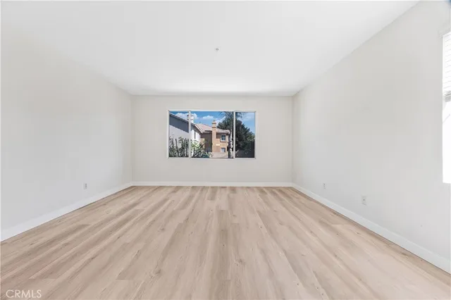 an empty room with a bench