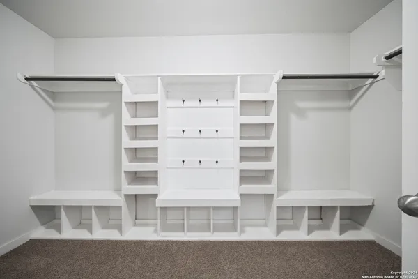 a living room with a furniture and a window