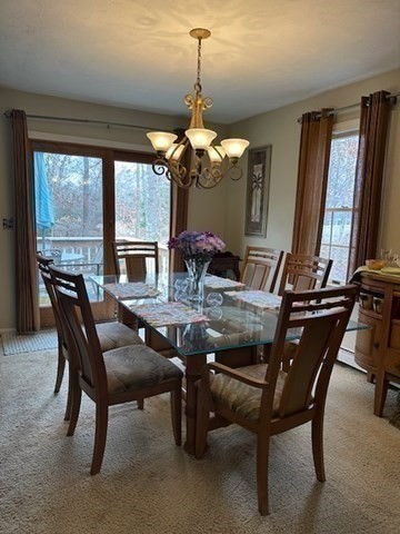54 Frazier Way Barnstable, MA 02648 - Photo 16 of 31 a view of a dining room with furniture and window