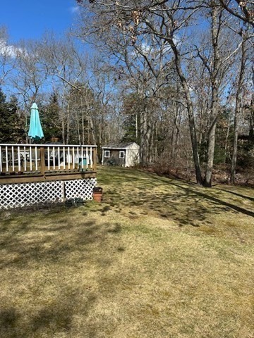 54 Frazier Way Barnstable, MA 02648 - Photo 4 of 31 a view of a wooden fence