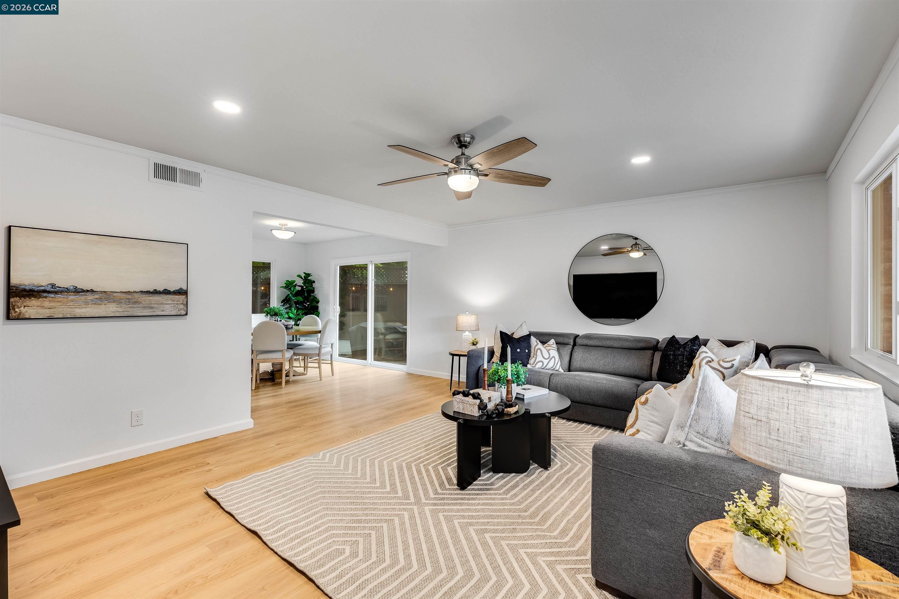 418 Devon Court San Ramon, CA 94583 - Photo 7 of 62 a living room with furniture and a wooden floor