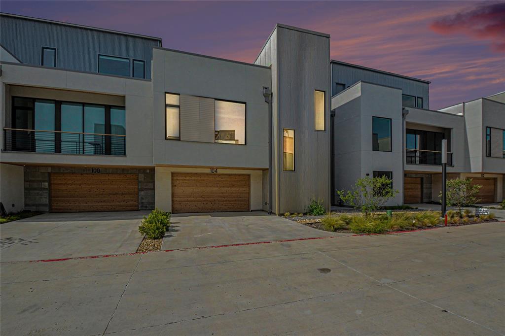 1111 Raiford Road, Unit 104 Carrollton, TX 75007 - Photo 5 of 30 Contemporary multi-level exterior with a mixed material facade