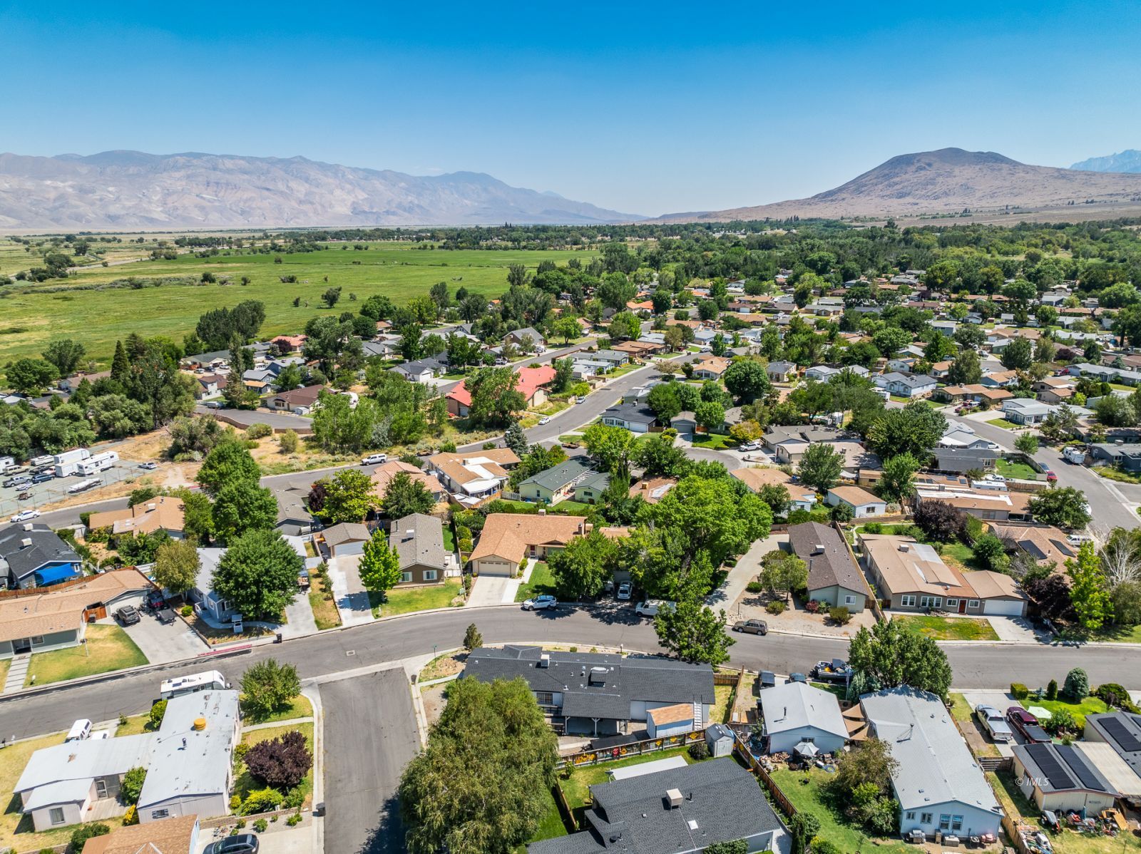 77 Olivia Lane Big Pine, CA 93513 - Photo 30 of 35 an aerial view of a city with lots of residential buildings