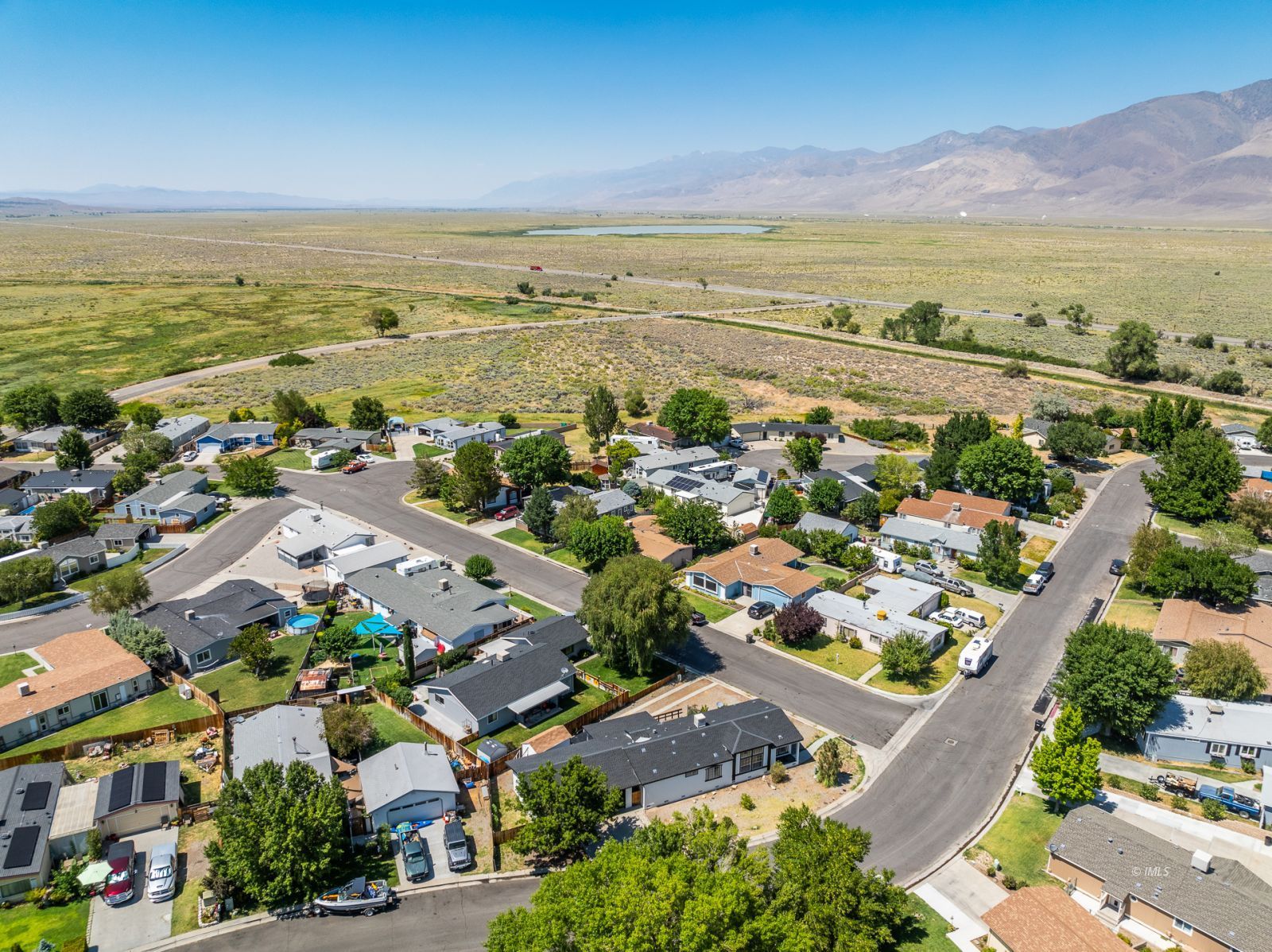 77 Olivia Lane Big Pine, CA 93513 - Photo 33 of 35 an aerial view of ocean and residential houses with outdoor space