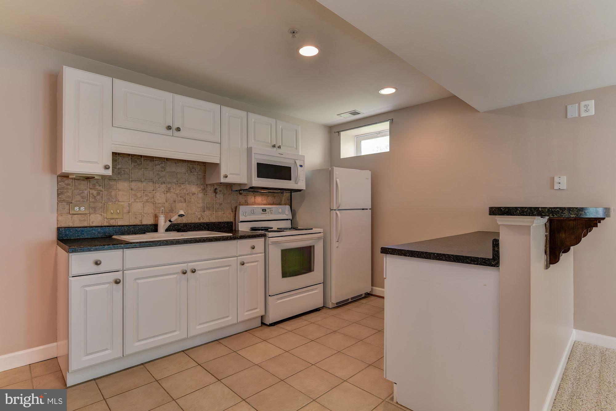 12005 Chestnut Glen Road Clarksburg, MD 20871 - Photo 44 of 56 Second kitchen in basement