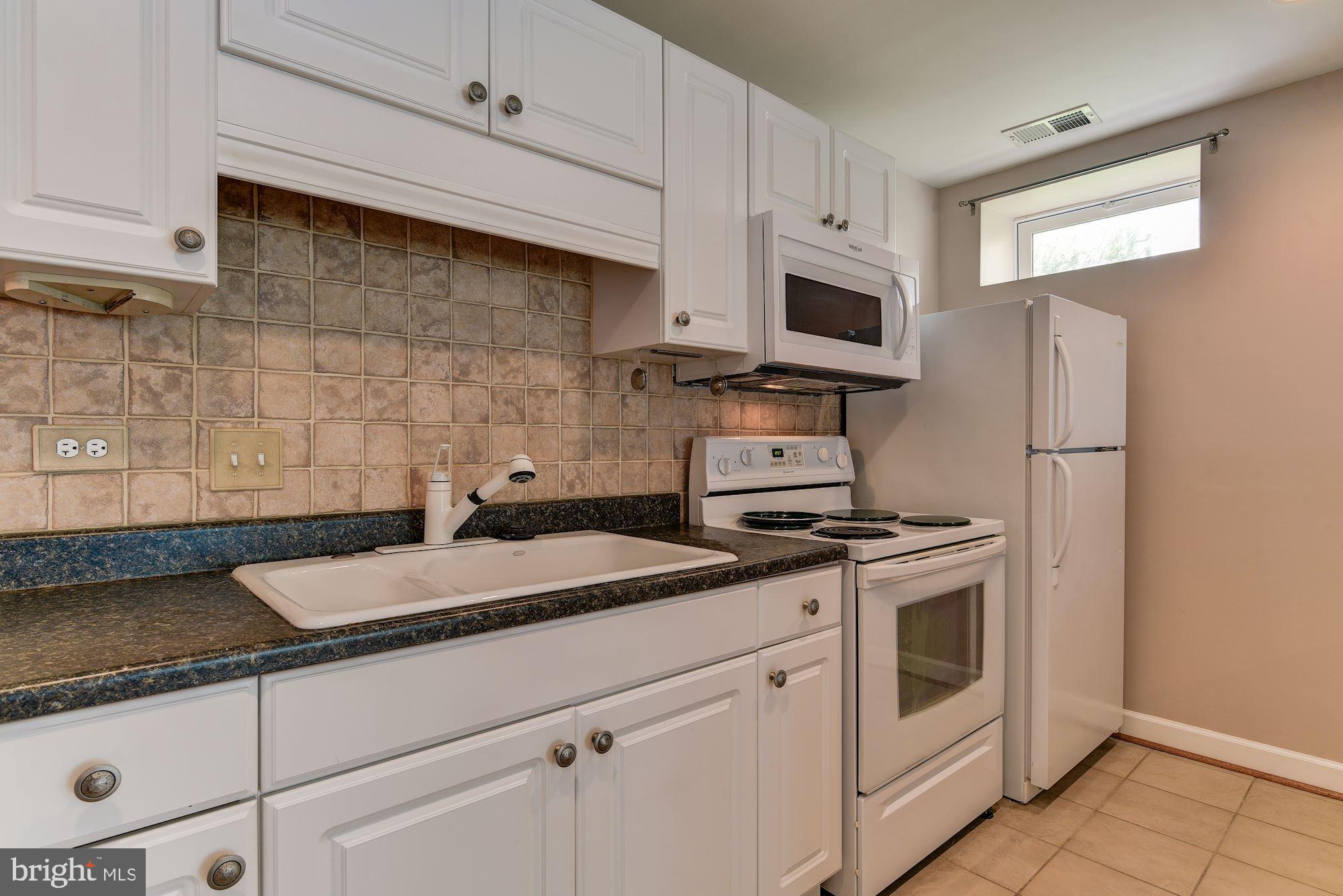 12005 Chestnut Glen Road Clarksburg, MD 20871 - Photo 45 of 56 Second kitchen in basement