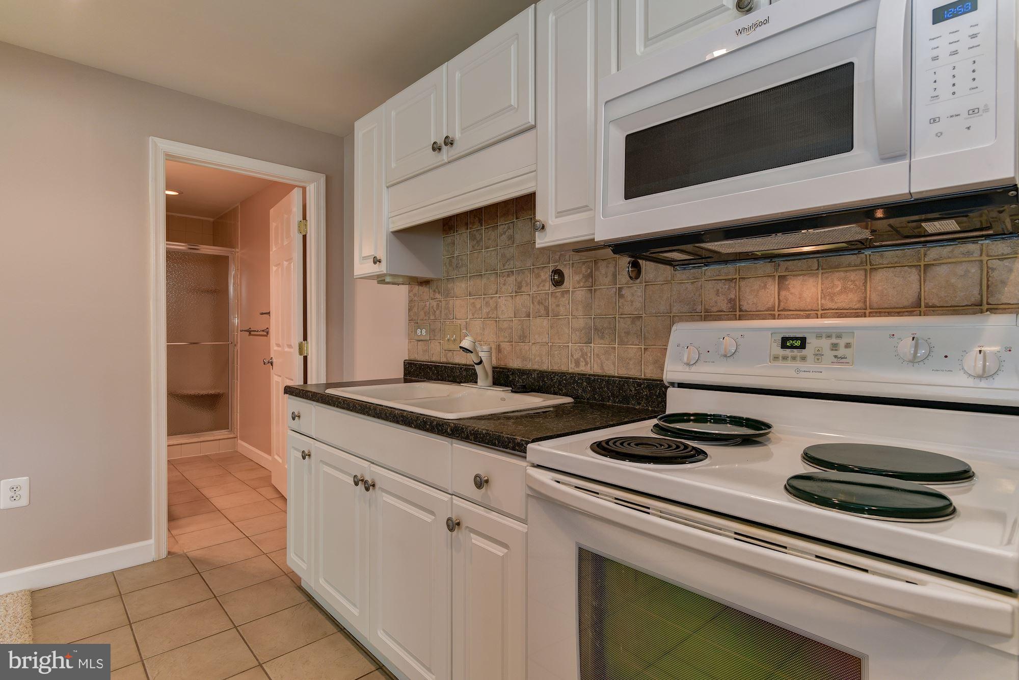 12005 Chestnut Glen Road Clarksburg, MD 20871 - Photo 47 of 56 Second kitchen in basement