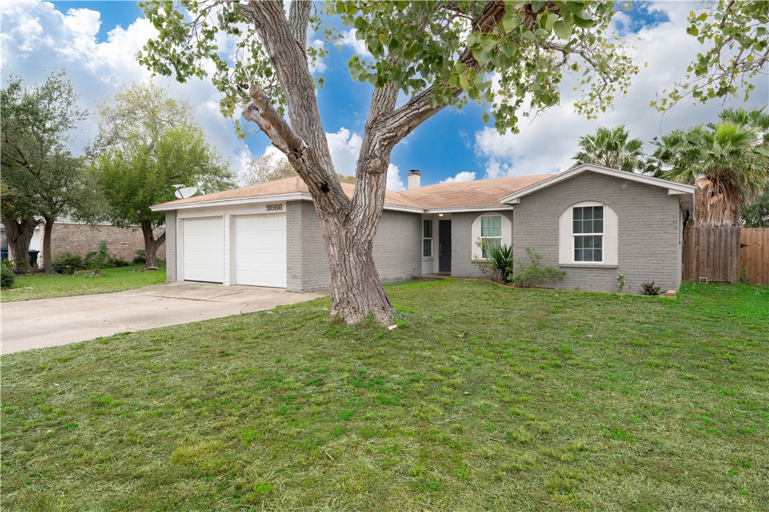 9566 Waxwing Street Corpus Christi, TX 78418 - Photo 3 of 20 a house view with a garden space