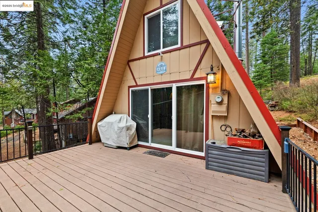 a view of outdoor space with deck and furniture