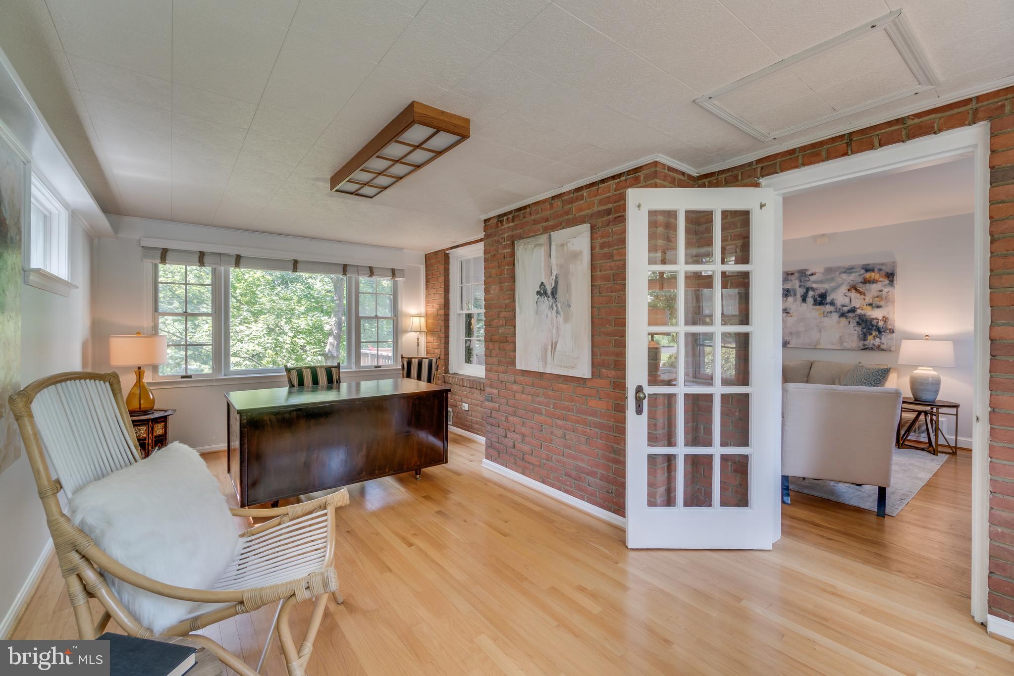 9618 Sutherland Road Silver Spring, MD 20901 - Photo 9 of 52 Exposed brick home office looking towards Living