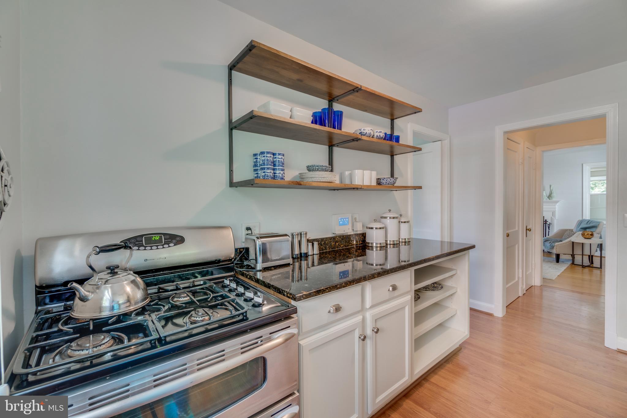 9618 Sutherland Road Silver Spring, MD 20901 - Photo 15 of 52 Gas stove/oven. Looking towards 1/2 bath + Living