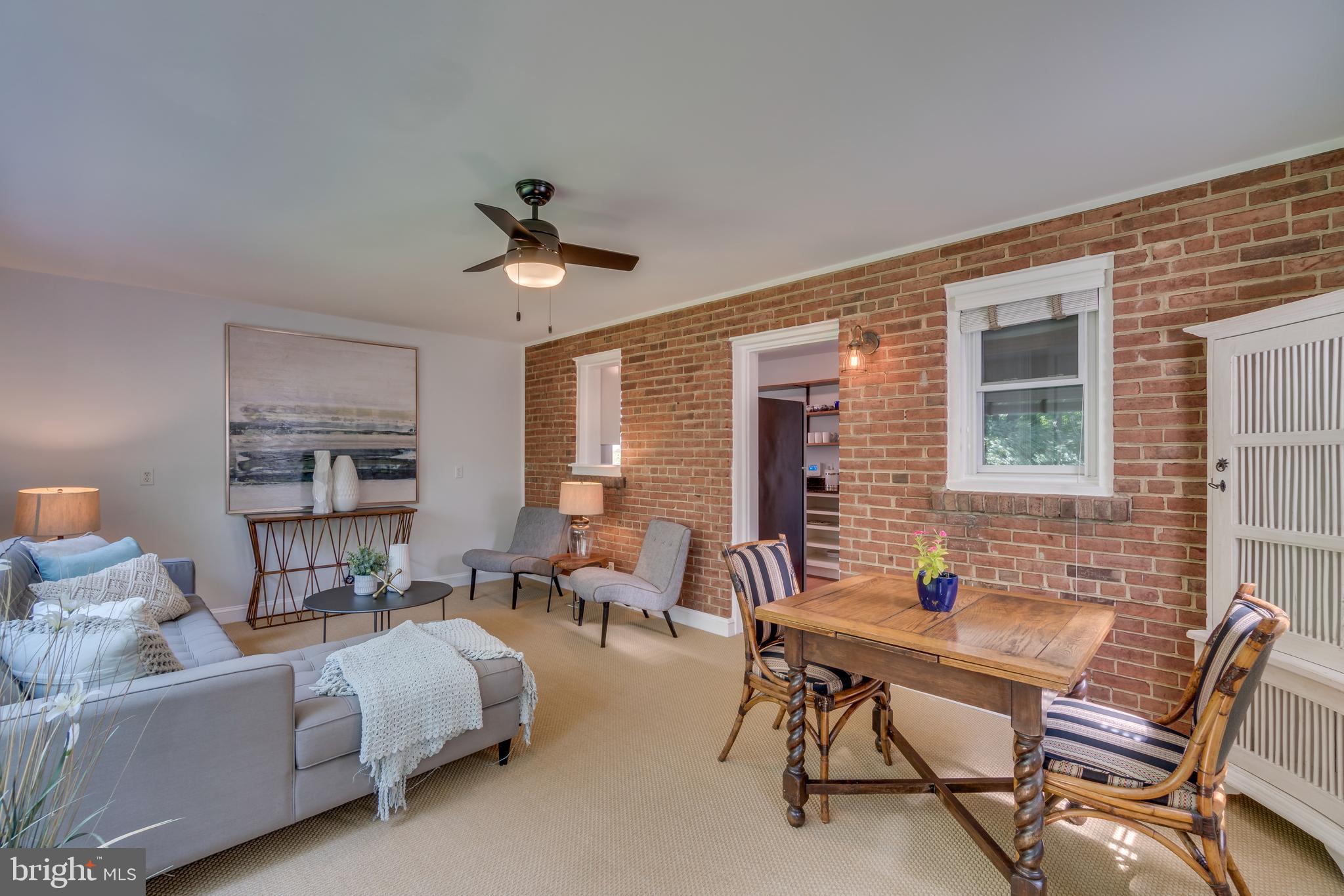 9618 Sutherland Road Silver Spring, MD 20901 - Photo 22 of 52 Exposed brick, sightline to kitchen. Unwind. Relax