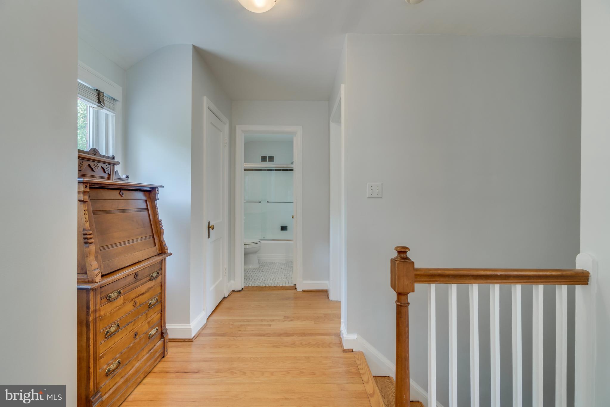 9618 Sutherland Road Silver Spring, MD 20901 - Photo 27 of 52 Upstairs hallway. Window reading/storage nook