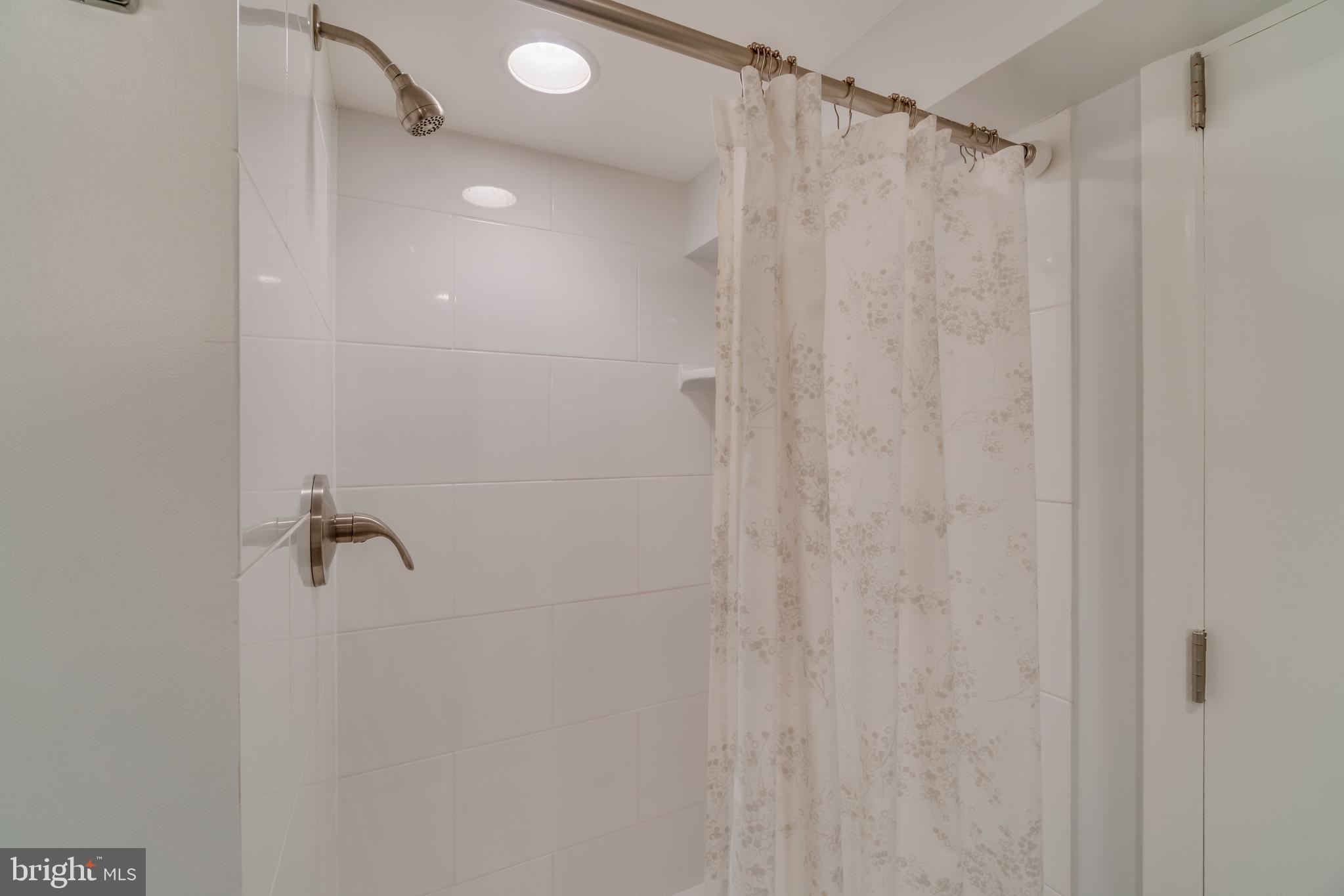 9618 Sutherland Road Silver Spring, MD 20901 - Photo 45 of 52 Shower is crisp, clean, perfect after a workout