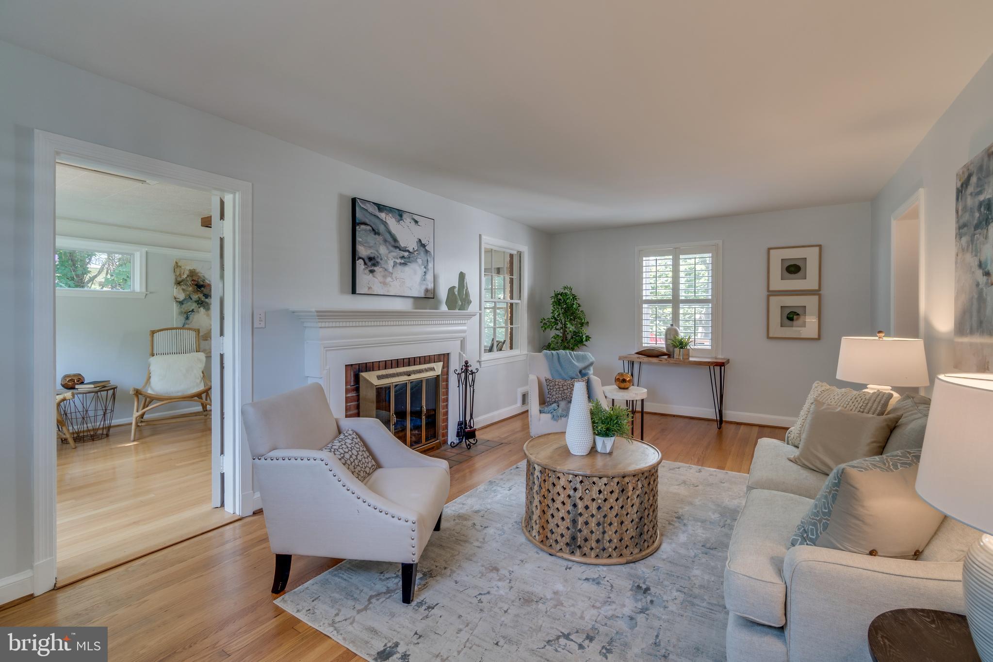 9618 Sutherland Road Silver Spring, MD 20901 - Photo 6 of 52 Inviting living room with wood burning fireplace