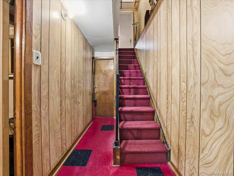 3330 Eastchester Road Bronx, NY 10469 - Photo 17 of 39 a view of a hallway with wooden floor and entryway