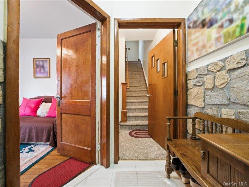 3330 Eastchester Road Bronx, NY 10469 - Photo 29 of 39 a view of an entryway with a door and a mirror