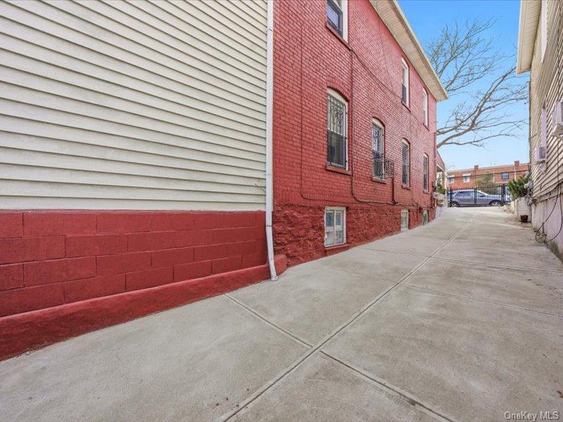 3330 Eastchester Road Bronx, NY 10469 - Photo 34 of 39 a view of a building with a street