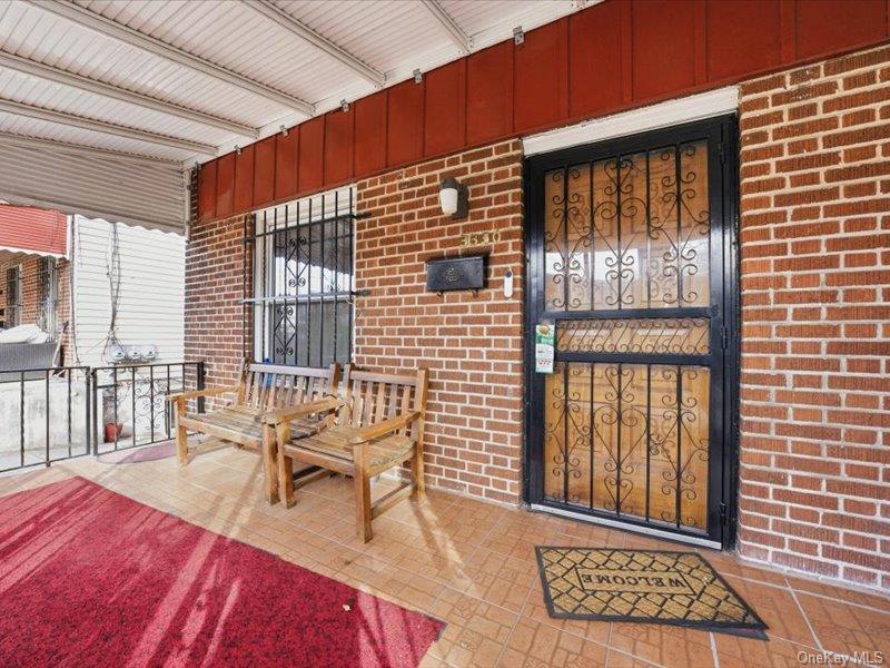 3330 Eastchester Road Bronx, NY 10469 - Photo 36 of 39 a balcony view with a outdoor seating space