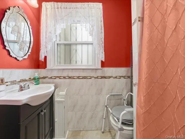 a bathroom with a sink and a shower
