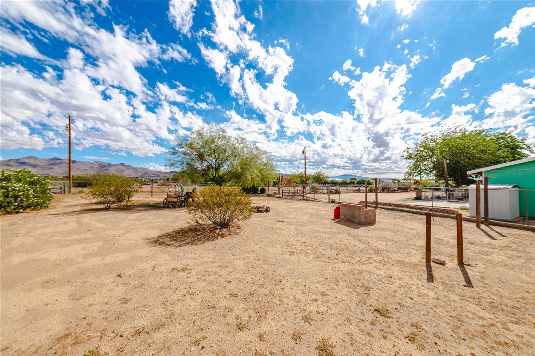 3535 Ajo Road Golden Valley, AZ 86413 - Photo 36 of 58 View of yard with a mountain view and a view of rural / pastoral area