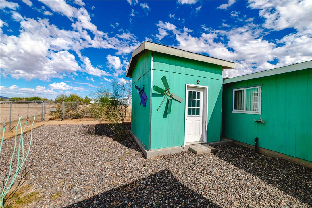 3535 Ajo Road Golden Valley, AZ 86413 - Photo 54 of 58 View of outbuilding featuring a fenced backyard