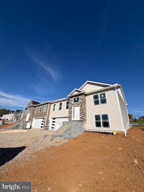 12267 Polktown Road Waynesboro, PA 17268 - Photo 2 of 4 a view of a white house with a yard