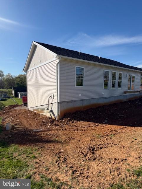 12267 Polktown Road Waynesboro, PA 17268 - Photo 3 of 4 a view of a house with a yard