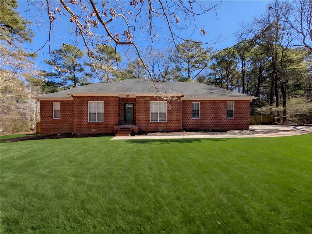 114 Riveredge Drive McDonough, GA 30252 - Photo 1 of 1 a view of a house with a garden