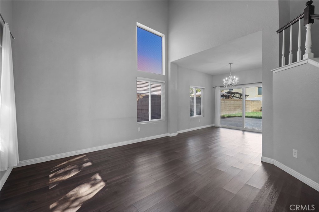 4117 East Ave R 13 Palmdale, CA 93552 - Photo 6 of 16 a view of an empty room with a window