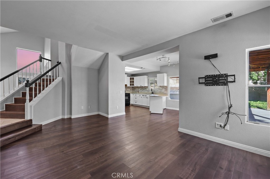 4117 East Ave R 13 Palmdale, CA 93552 - Photo 10 of 16 a view of a kitchen and an empty room