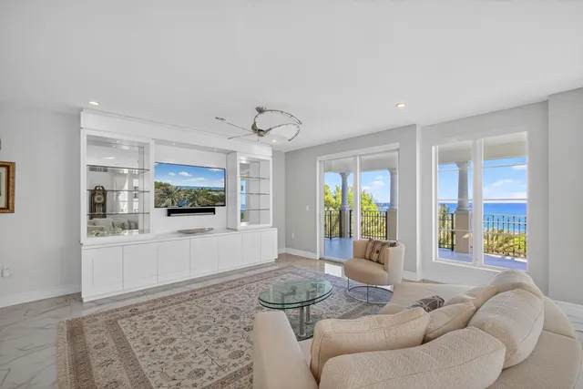 a view of a swimming pool with a deck