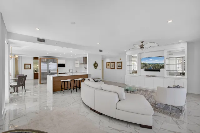 a view of swimming pool with outdoor seating