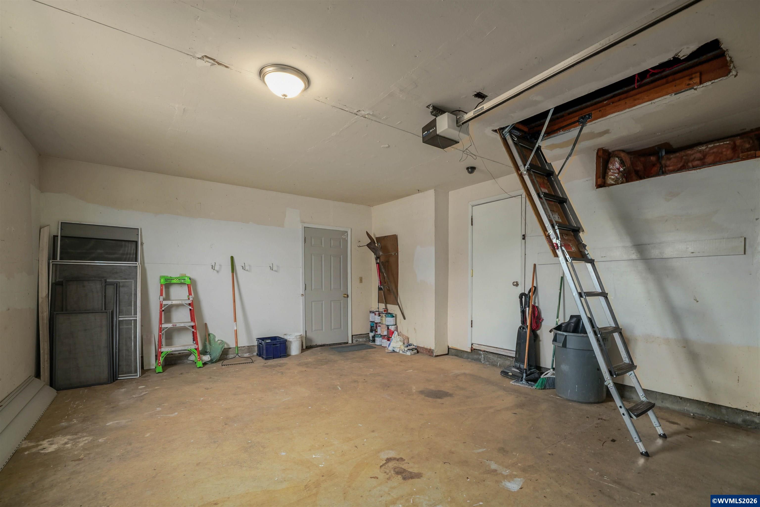 220 Northwest Downy Drive Sublimity, OR 97385 - Photo 21 of 47 a view of garage with stairs