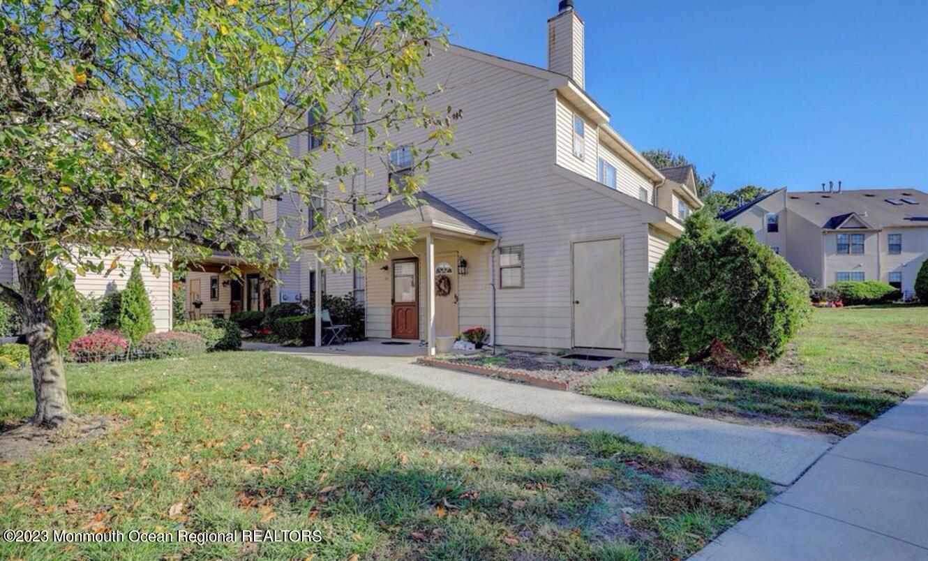 207 Violet Lane Jackson, NJ 08527 - Photo 5 of 5 a view of a house with a yard and tree s