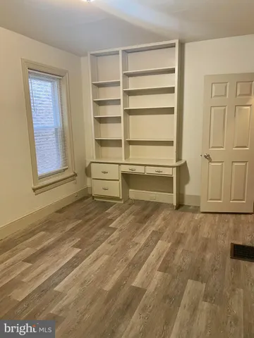 an empty room with window