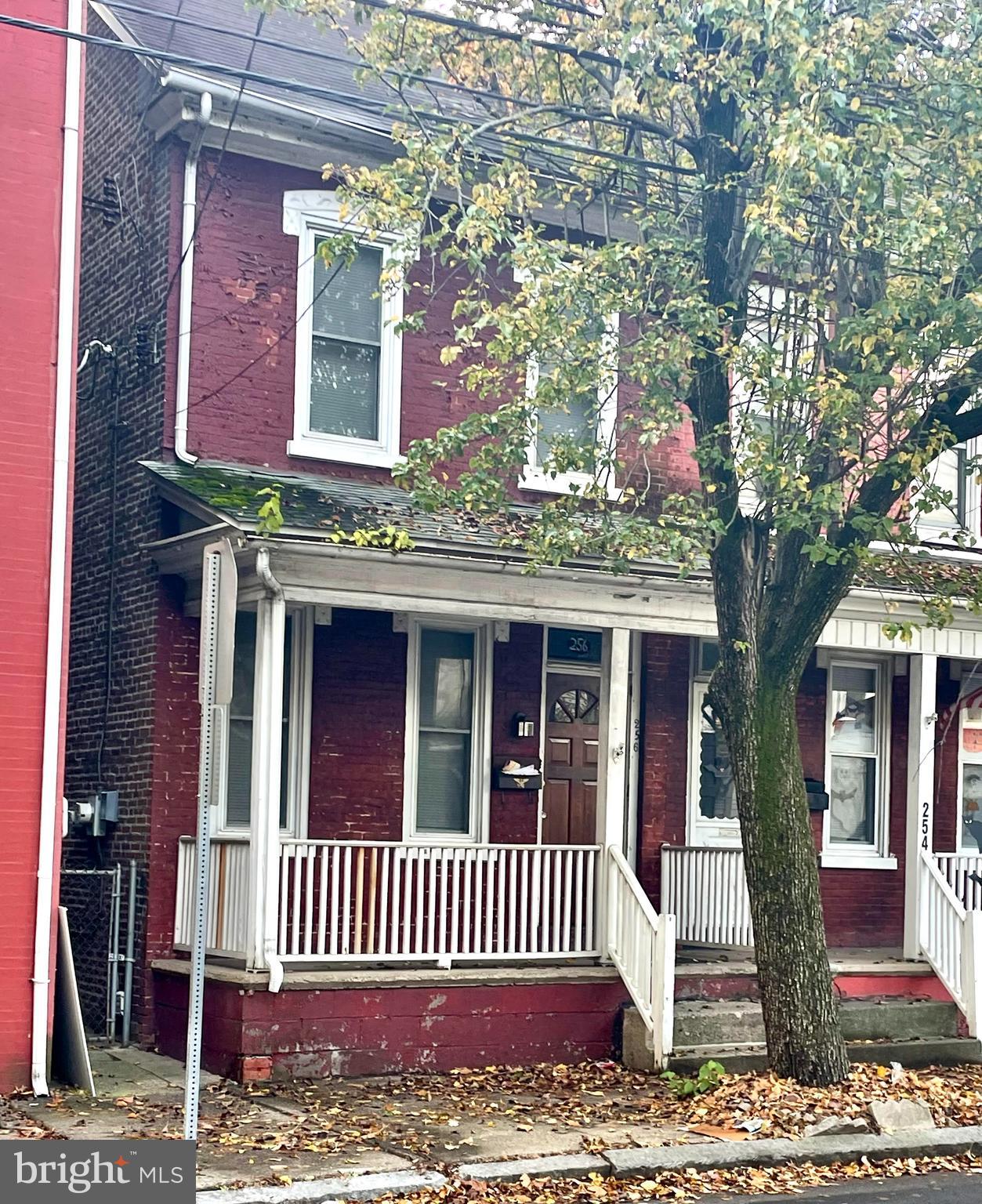 256 Beech Street Pottstown, PA 19464 - Photo 3 of 25 a front view of a house with a garden