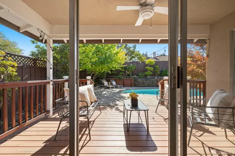 a view of balcony with chairs