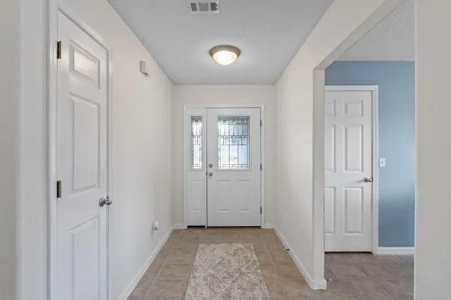 a view of a livingroom with a entryway