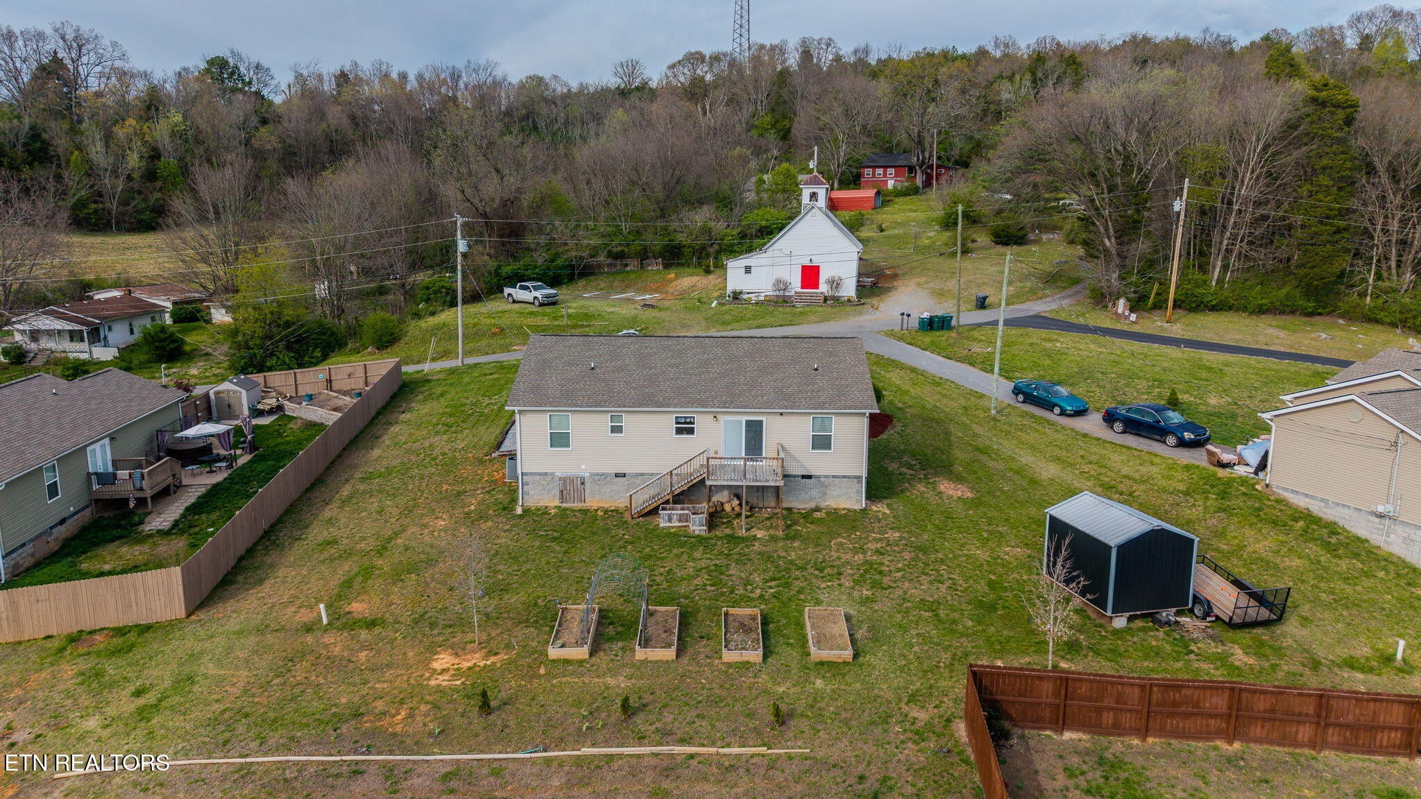 3215 Smith Road White Pine, TN 37890 - Photo 27 of 28 a view of a house with a yard