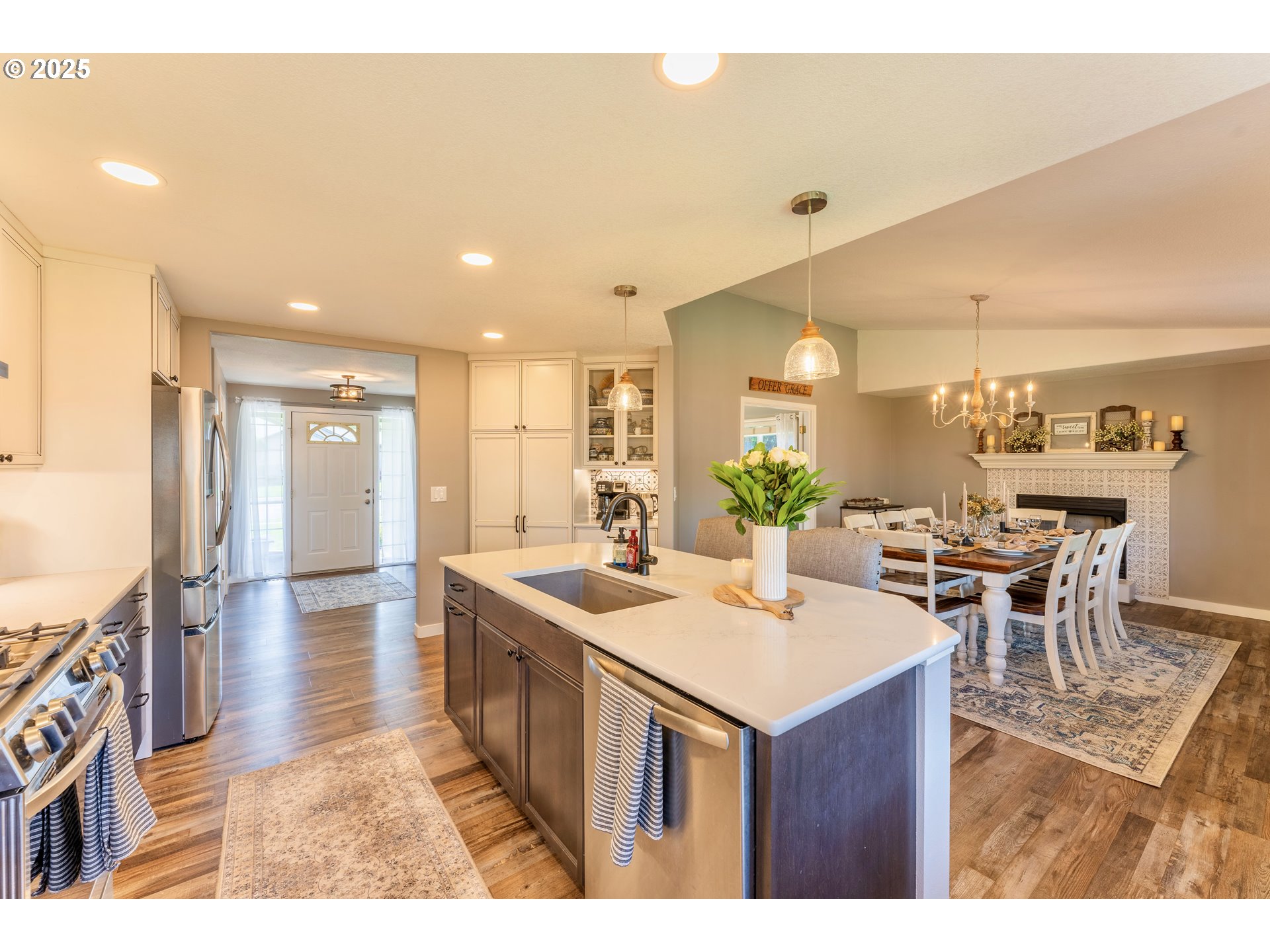 3983 Southeast 30th Street Gresham, OR 97080 - Photo 13 of 34 a open kitchen with kitchen island a sink table and chairs