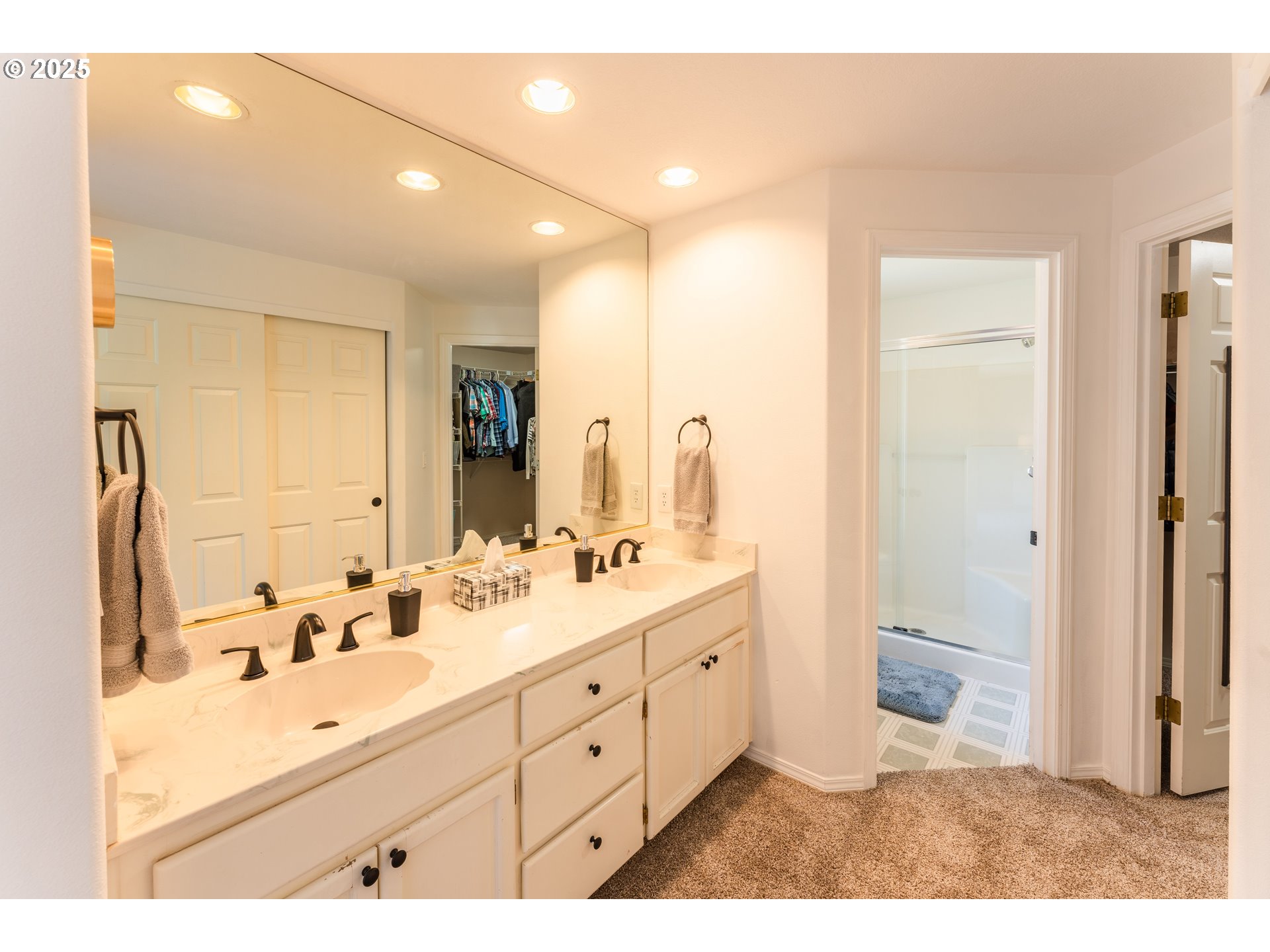 3983 Southeast 30th Street Gresham, OR 97080 - Photo 18 of 34 a bathroom with a double vanity sink a toilet and a mirror