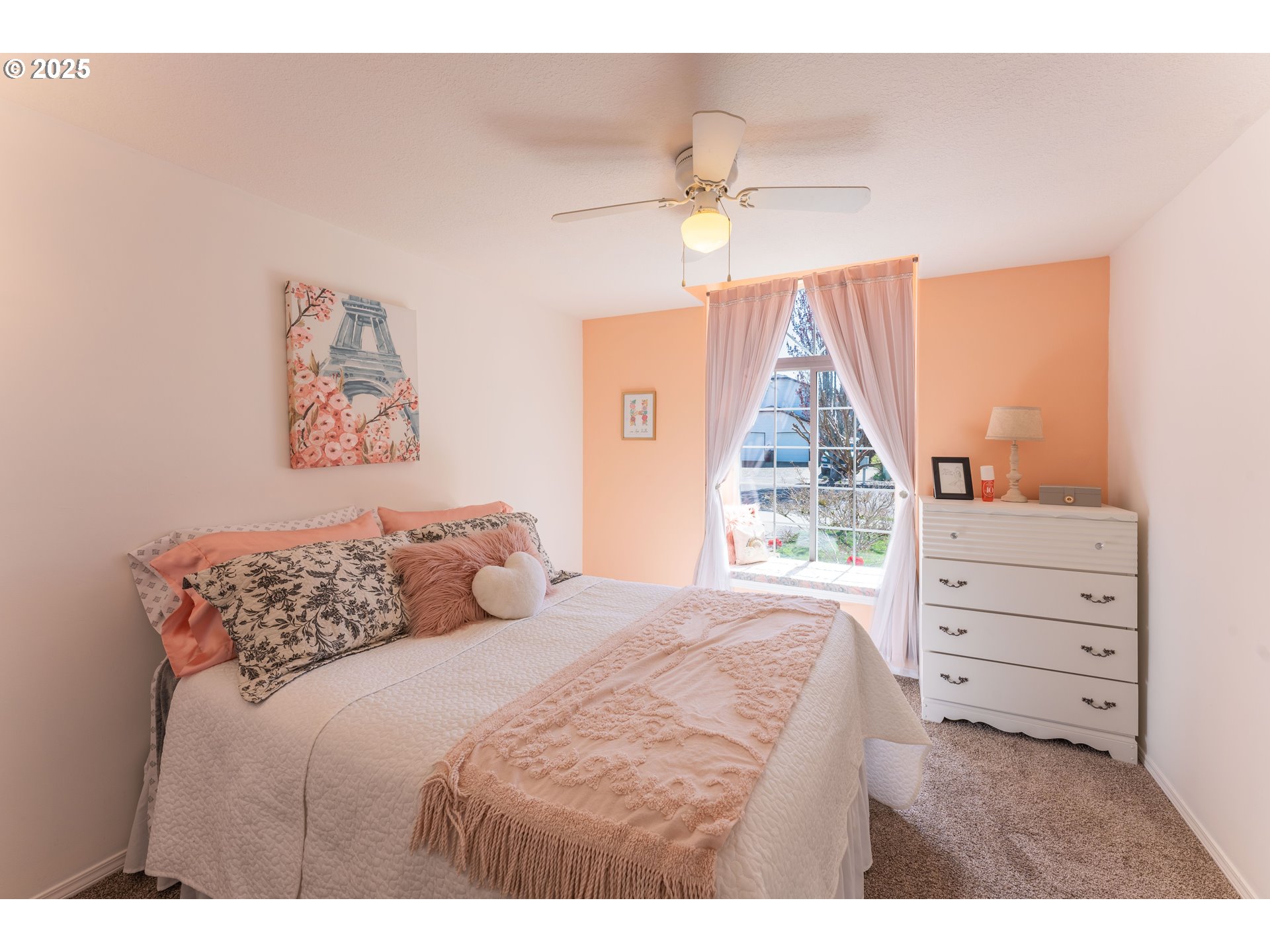3983 Southeast 30th Street Gresham, OR 97080 - Photo 22 of 34 a bedroom with a bed and a chandelier