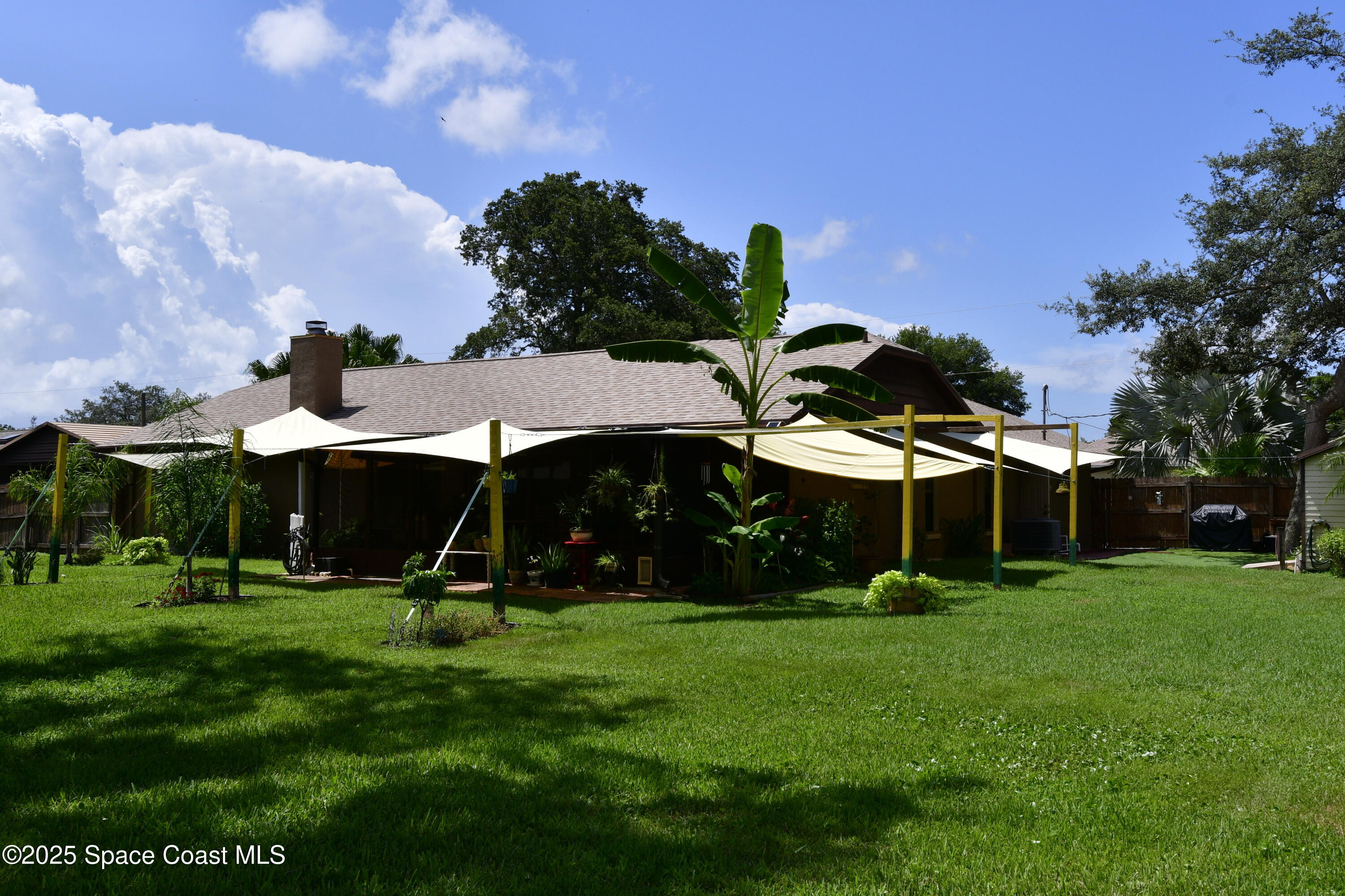 4501 Seattle Street Cocoa, FL 32927 - Photo 12 of 13 a view of a park with swings