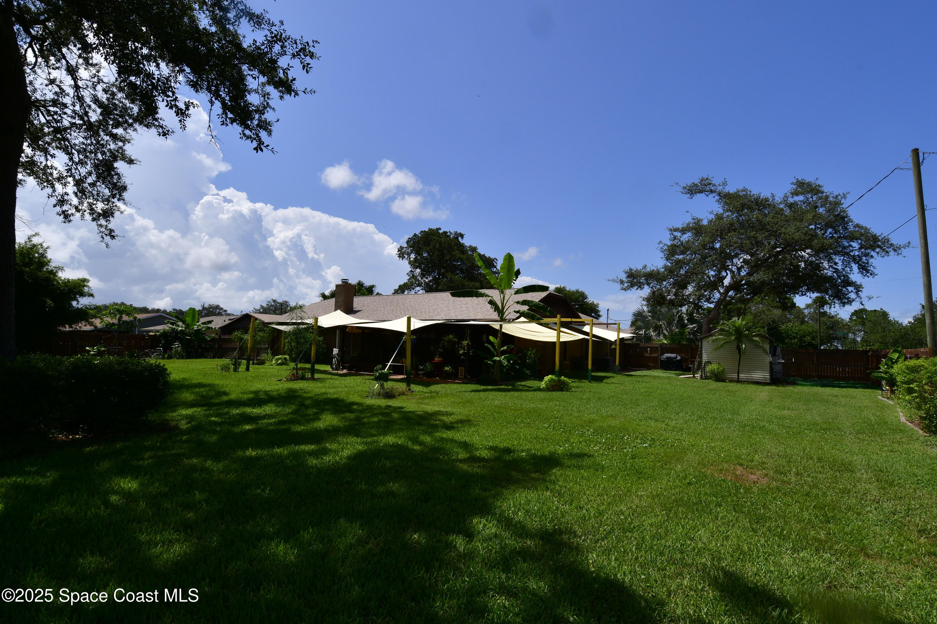 4501 Seattle Street Cocoa, FL 32927 - Photo 2 of 13 a view of a garden
