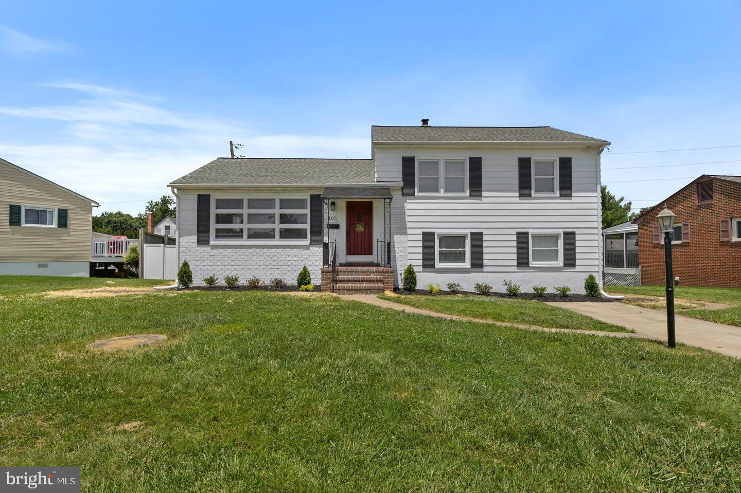 105 Michael Avenue Linthicum Heights, MD 21090 - Photo 1 of 24 a front view of house with yard and green space