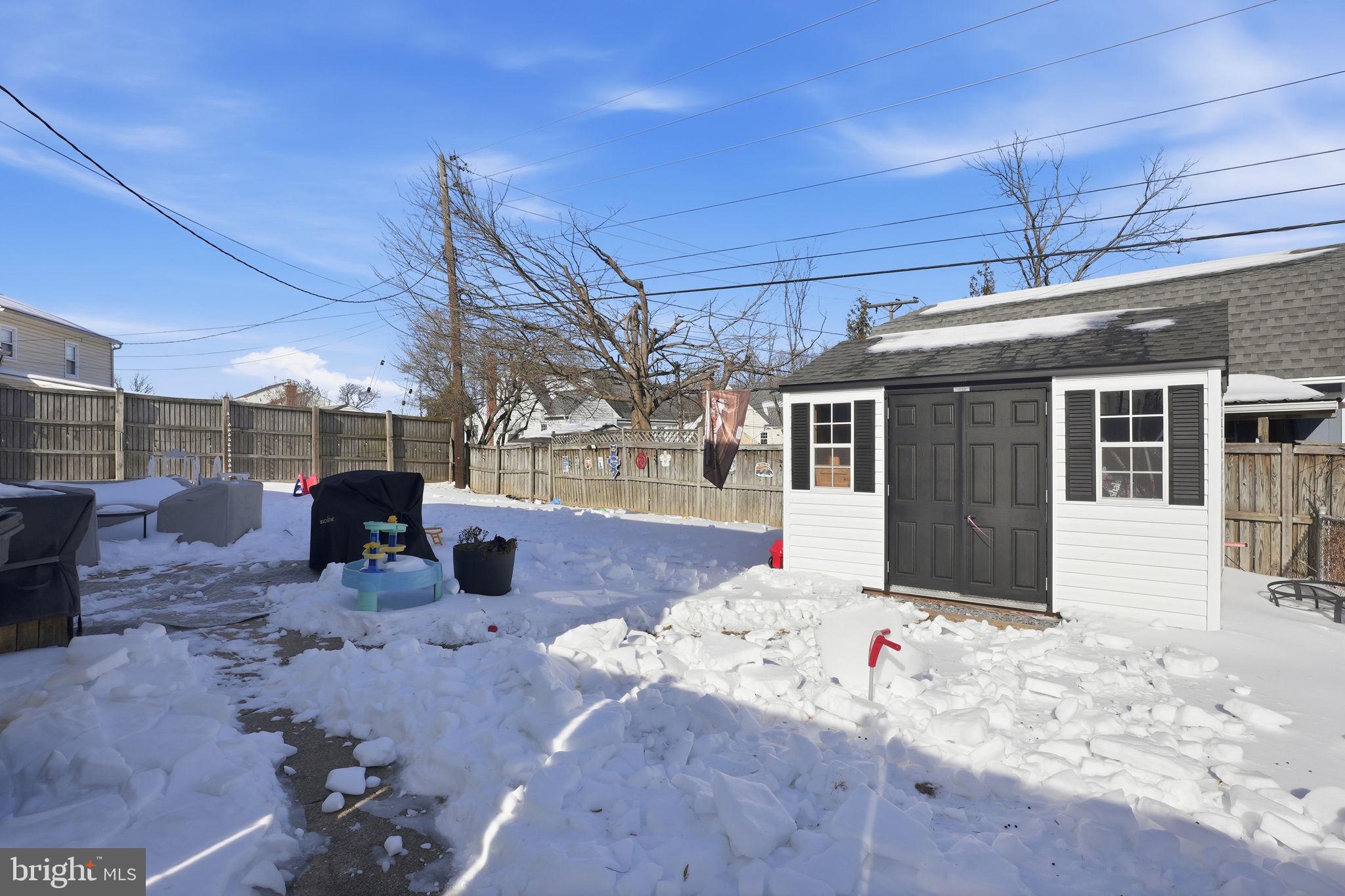 105 Michael Avenue Linthicum Heights, MD 21090 - Photo 22 of 24 a view of a house with a patio